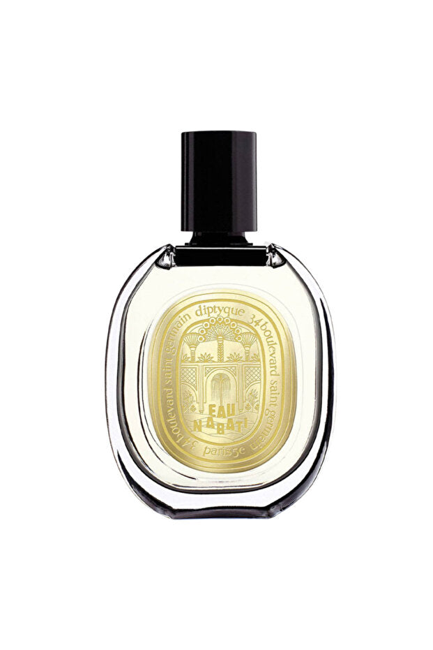 Perfume bottle with gold label on a white background