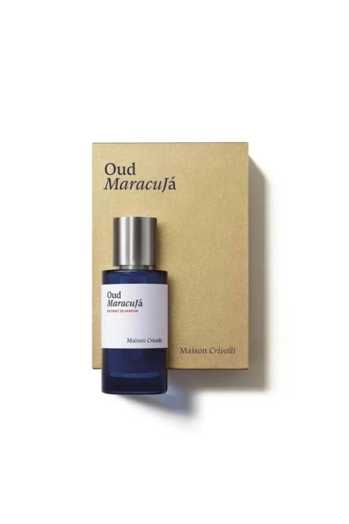 Blue perfume bottle with silver cap next to a cardboard box labeled 'Oud Maracuja' on a white background.