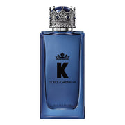 Blue Dolce & Gabbana perfume bottle with silver cap on a white background