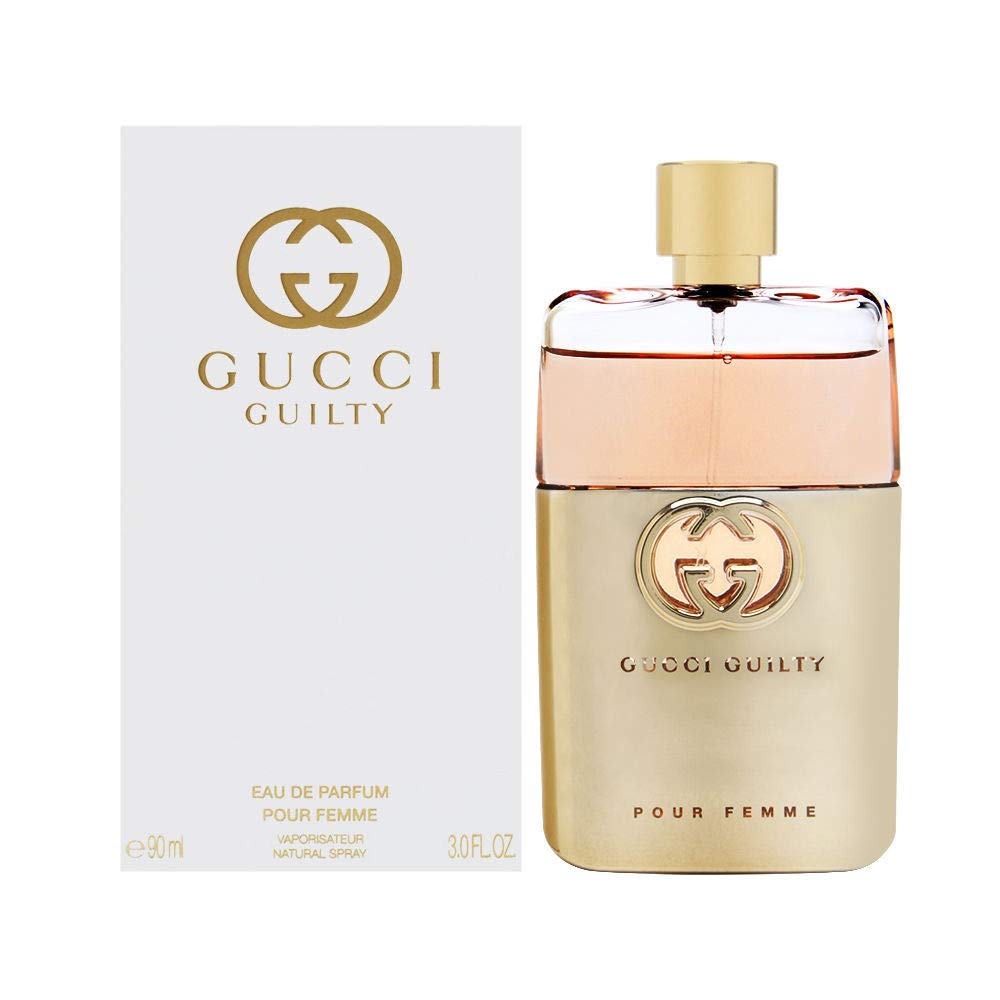 Gucci Guilty perfume bottle and packaging on a white background