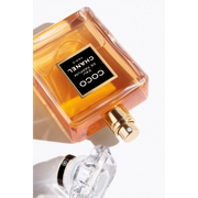 Chanel Coco perfume bottle on a white background
