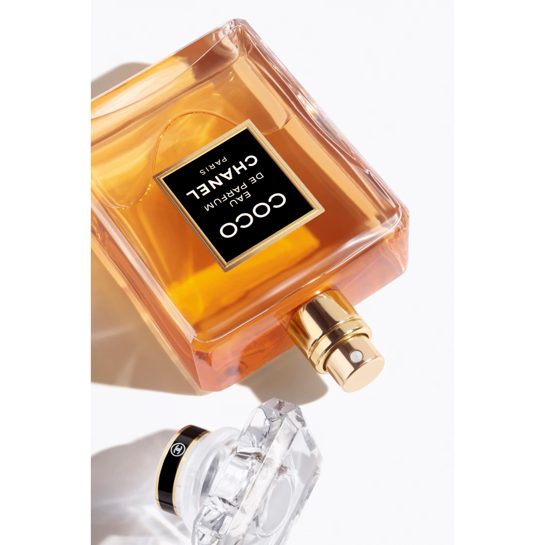 Chanel Coco perfume bottle on a white background