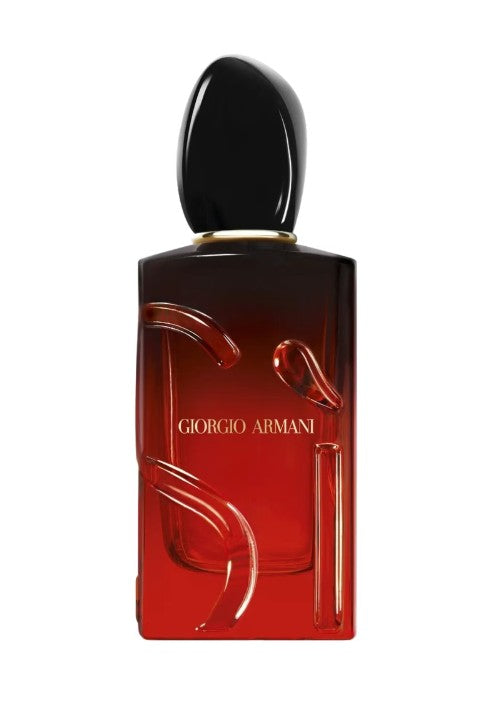 Red Giorgio Armani perfume bottle on a white background