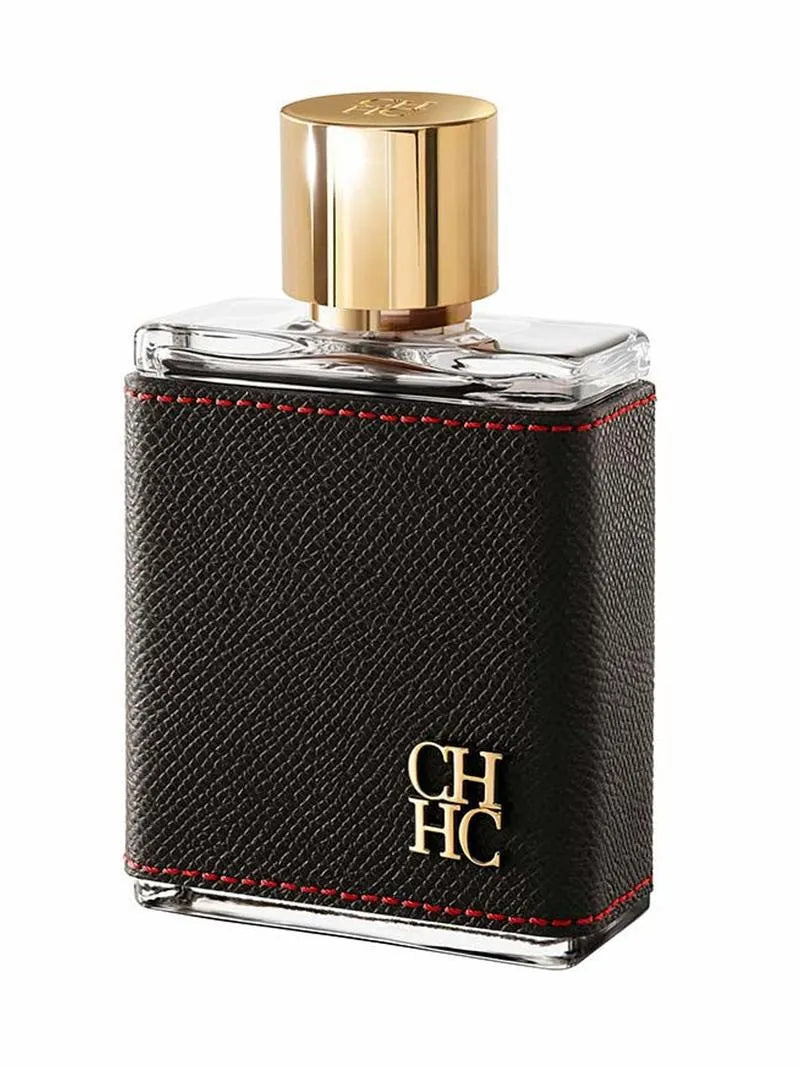 Perfume bottle with black leather-like cap and gold accents on a white background