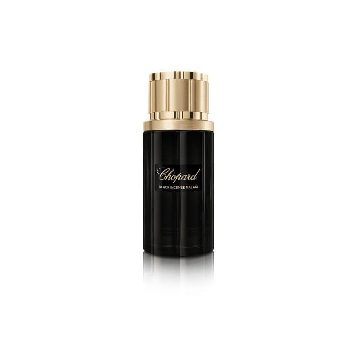 Black and gold Chopard perfume bottle on a white background