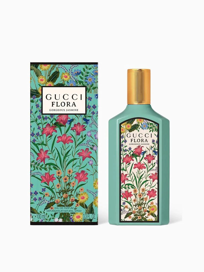 Gucci Flora perfume bottle and packaging with floral design on a white background