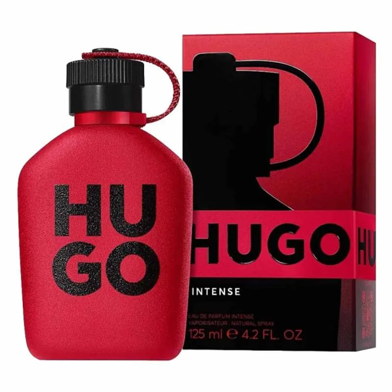 Red Hugo Boss perfume bottle and packaging on a white background