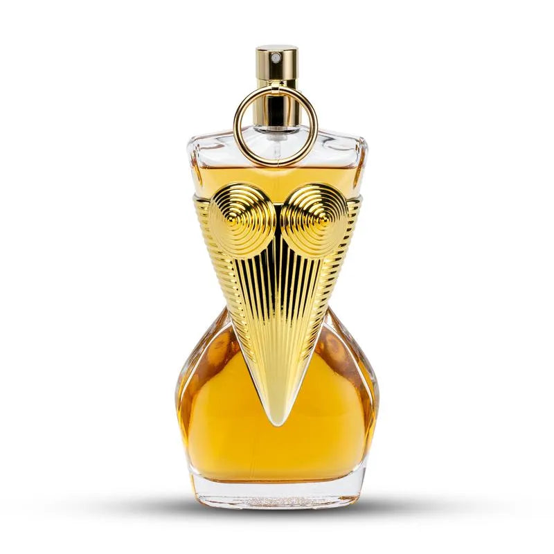 Perfume bottle with gold cap and design on a white background