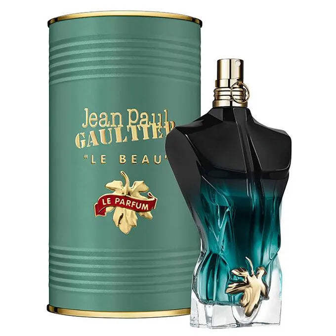 Jean Paul Gaultier perfume bottle and green cylindrical container on a white background