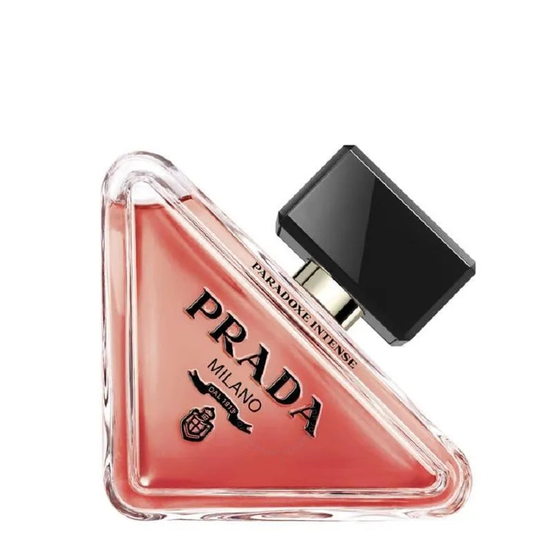 Prada perfume bottle with a triangular design on a white background