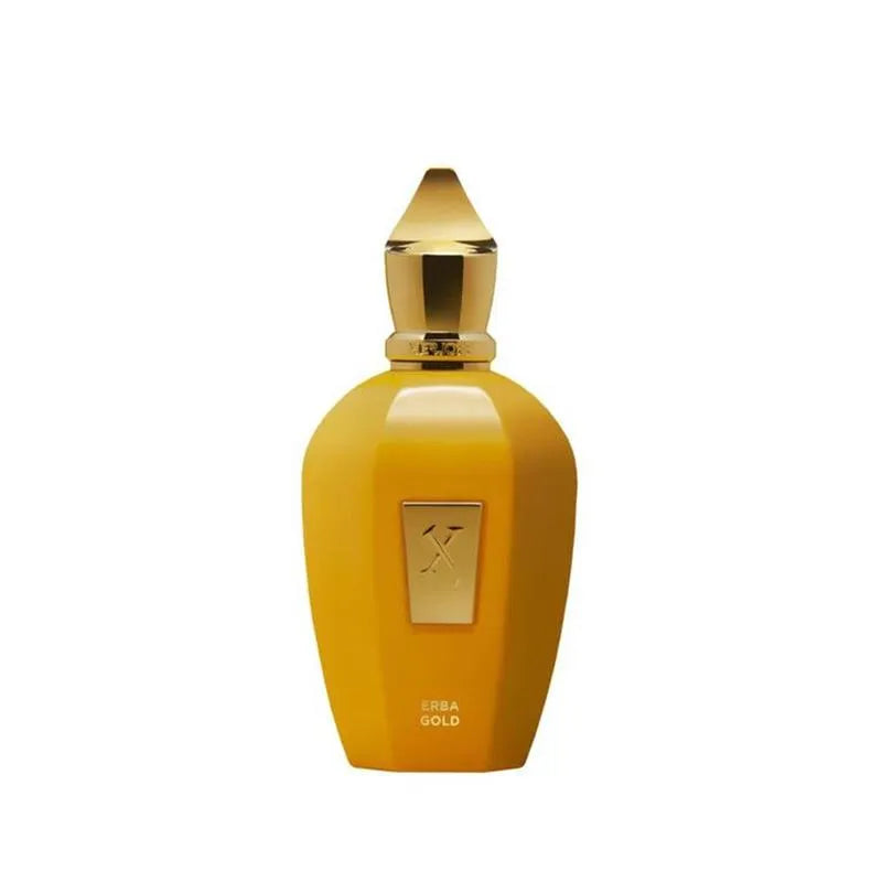 Yellow perfume bottle with gold cap on a white background