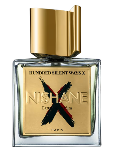 Nishane perfume bottle with gold cap and label on a black background