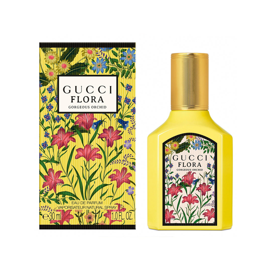 Gucci Flora perfume bottle and packaging with floral design on a white background