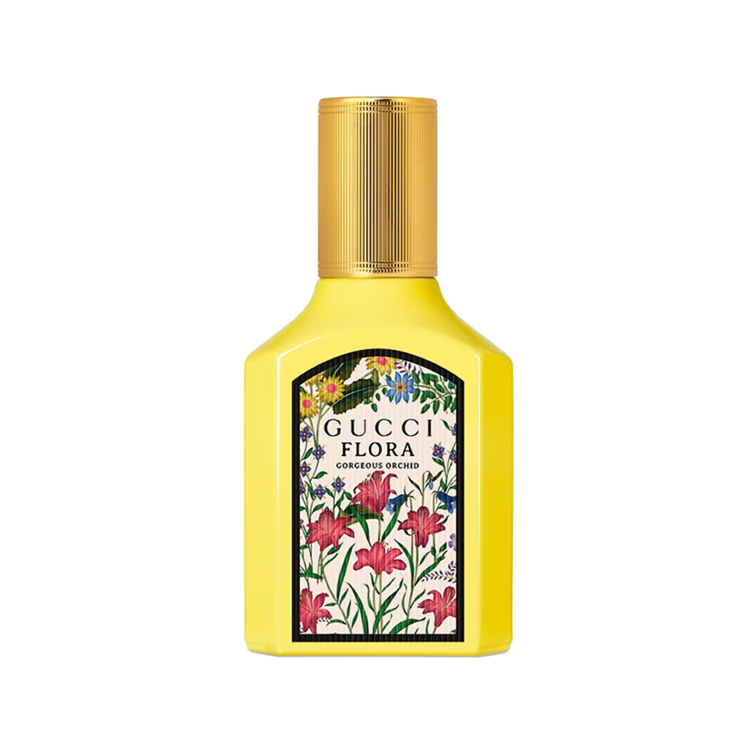 Gucci Flora perfume bottle with floral design on a white background