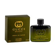 Gucci Guilty perfume bottle and packaging on a white background
