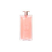 Pink perfume bottle with a rose gold cap on a white background